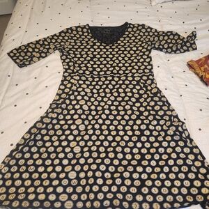 Svaha A-line typewriter dress